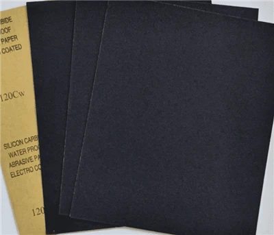 Kako so abrazivni delci na brusnem papirju pritrjeni na osnovni material? Kat...
